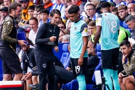 Danny Cowley passes on advice to Dane Scarlett before his Pompey debut in Saturday's 3-3 draw at Sheffield Wednesday. Picture: Malcolm Bryce/ProSportsImages