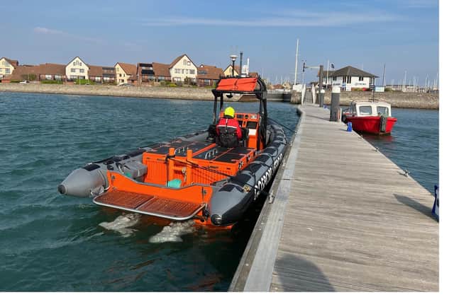 Gosport lifeboat alongside at Port Solent marina collecting crew who had helped the children in Tipner Lake