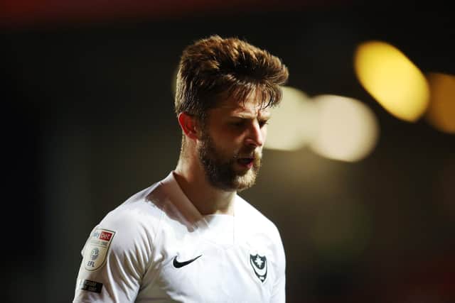 Pompey winger Michael Jacobs will sit out Saturday's visit of Gilingham