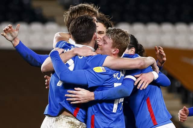 Pompey celebrate on the way to the top of the league last night (Photo by Daniel Chesterton/phcimages.com)