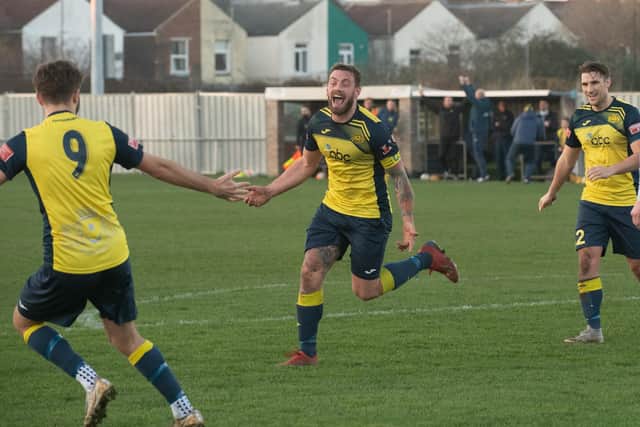 Steve Hutchings celebrates after scoring his 250th goal for the club.

Picture: Keith Woodland
