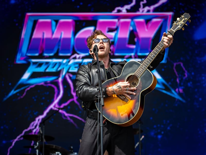 McFly were the surprise artist to perform on the Castle Stage on Saturday afternoon to a packed crowd.Pictured - McFlyPhotos by Alex Shute