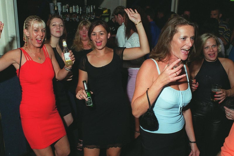 Revellers dancing the night away at Buddies 25+ nightclub at The Pyramids Centre, Southsea.