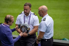 Will and James both on Centre Court at Wimbledon. Picture: Royal Navy.