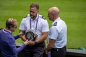Will and James both on Centre Court at Wimbledon. Picture: Royal Navy.