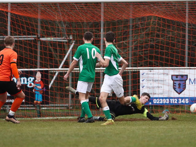 Portchester (orange) score their second goal. Picture: Stuart Martin