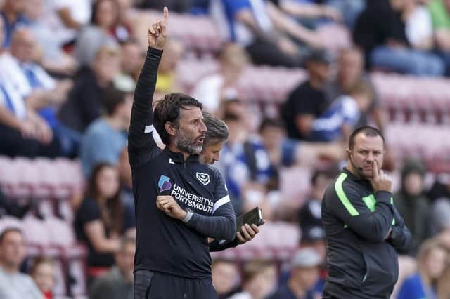 Pompey head coach Danny Cowley appeals for a decision during today's 1-0 defeat at the hands of Wigan.