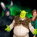 The Portsmouth Players present Shrek: The Musical at The Kings Theatre, Southsea from October 11-15, 2022. From left: Tom Wood as Donkey, Jack Edwards as Shrek, Lauren Kempton as Princess Fiona. Picture by Cinnabar Studios