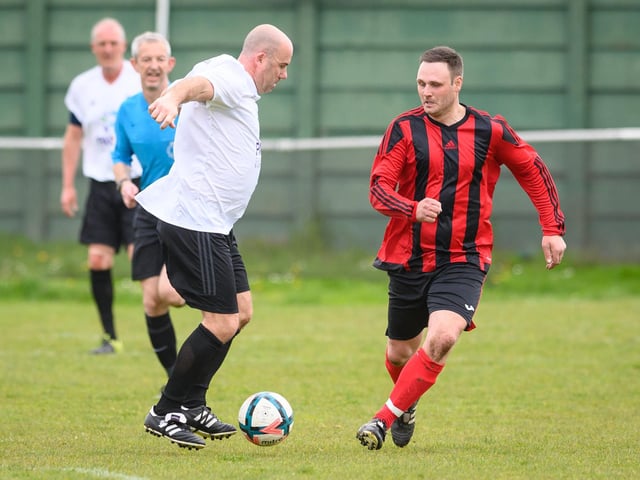 Action from the Jon Gittens memorial charity match between a team of former Fareham Town players and a side of ex-Pompey and Southampton professionals. Picture: Keith Woodland (160421-576)