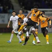 Christian Saydee battles with Cambridge United's Jordan Cousins in Pompey Abbey Stadium encounter. Picture: Jason Brown/ProSportsImages