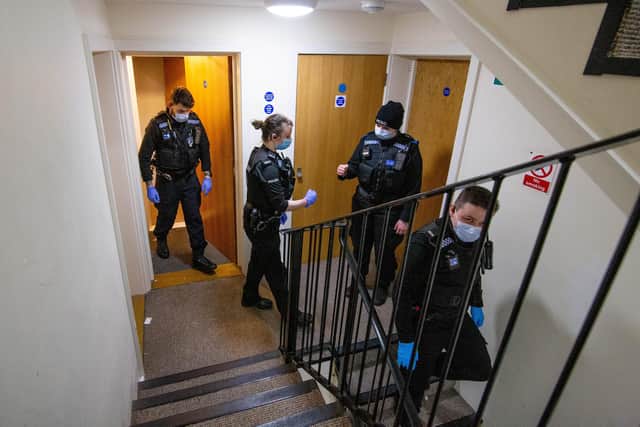 Police officers leaving suspect's flat in Southsea
Picture: Habibur Rahman