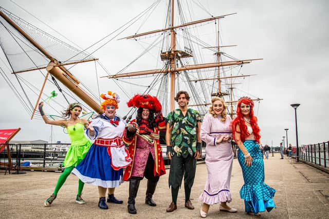 Pictured: Geogia Deloise, Jack Edwards, Shaun Williamson, James Argent, Elizabeth Rose and Julia Worsley near HMS Warrior at the Historic Dockyard, Portsmouth. Pictured is the cast on September 19 ahead of the launch of the Christmas pantomime at The Kings Theatre. Picture: Habibur Rahman