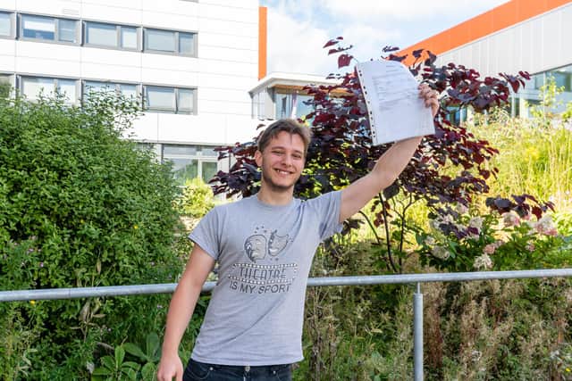 Oscar Flatt with his A-level results at Fareham College