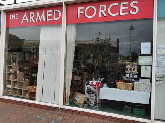 The smashed window of Gosport's Armed Forces charity shop. Photo: Gosport police