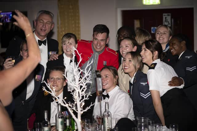 Military colleagues gather around a table for a group photo at last year's Proud To Be PHU Awards. Picture: Portsmouth Hospitals University NHS Trust