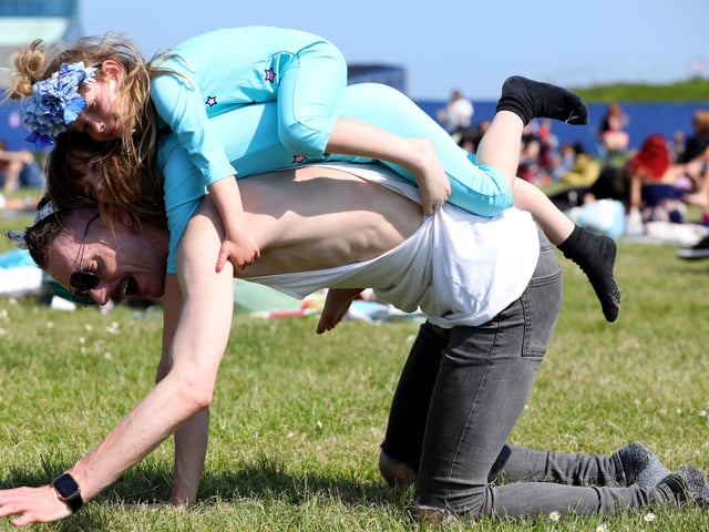 Levi Norton with Melody, 6, and Amara, 5, top. Live at the Bandstand, Castle Field, SouthseaPicture: Chris Moorhouse (jpns 270523-40)