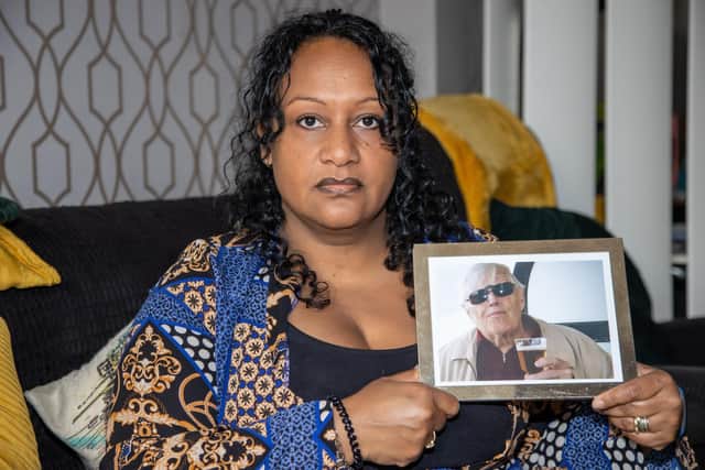 Ruth Warlow is still fighting to find out what happened to her father after he was discharged to Glen Heathers care home without her knowledge and passed away shortly after. Pictured here holding a photo of her late father. Picture: Alex Shute