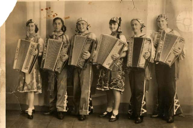Maisie Smith played the accordion for troops during the war.