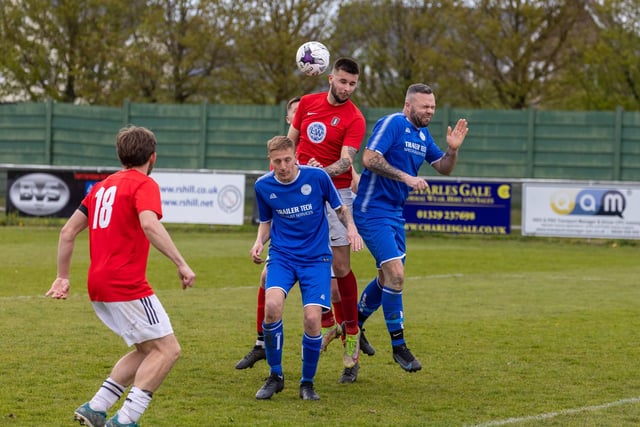 Action from Gosport Town's 4-0 victory over Lee Rangers (blue kit) in the Portsmouth & District FA Trophy final at Cams Alders. Picture: Alex Shute