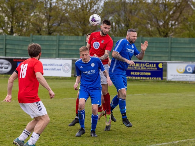 Action from Gosport Town's 4-0 victory over Lee Rangers (blue kit) in the Portsmouth & District FA Trophy final at Cams Alders. Picture: Alex Shute