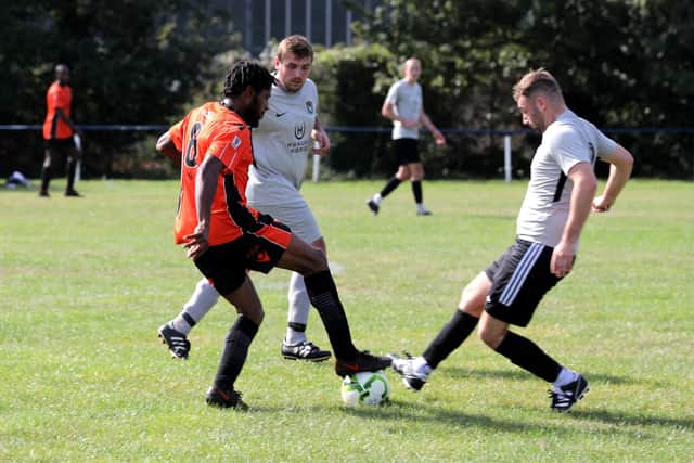AFC Portchester (orange) v Seagull.
Picture: Sam Stephenson