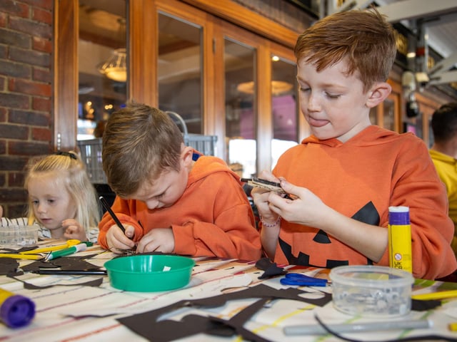 People flocked to Port Solent on Thursday to enjoy the half term entertainment, including arts and craft, face painting and magic shows.Pictured - Mila, 3, Cooper, 4 and Colby, 6 enjoying the Creation StationPhotos by Alex Shute