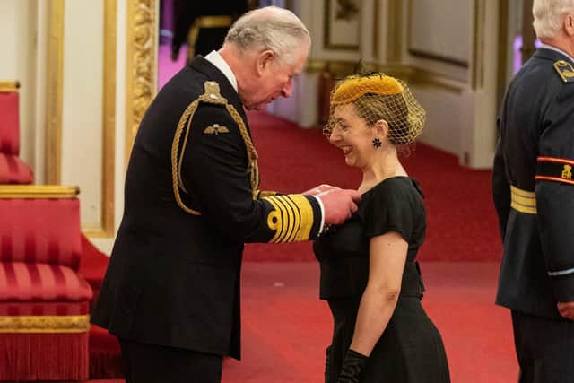 Rachel Lloyd is made a Companion of the Order of St Michael and St George by the Prince of Wales during an investiture ceremony at Buckingham Palace in London. Photo credit: Dominic Lipinski/PA Wire