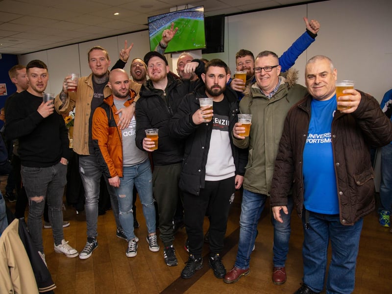Cheers! Fans inside the Victory Lounge get the pints in ahead of the game.