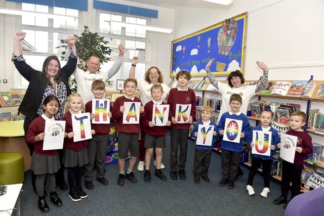 The 'Thank A School Superhero' campaign was launched at Meon Junior School in Southsea.
Pictured is: (back l-r) Sara Paine, executive head, Mike Stoneman, deputy director for education, cllr. Suzy Horton, deputy leader and cabinet member for children, families and education and Ruth Vonk, school headteacher, with some of the children.
Picture: Sarah Standing (110124-4524)