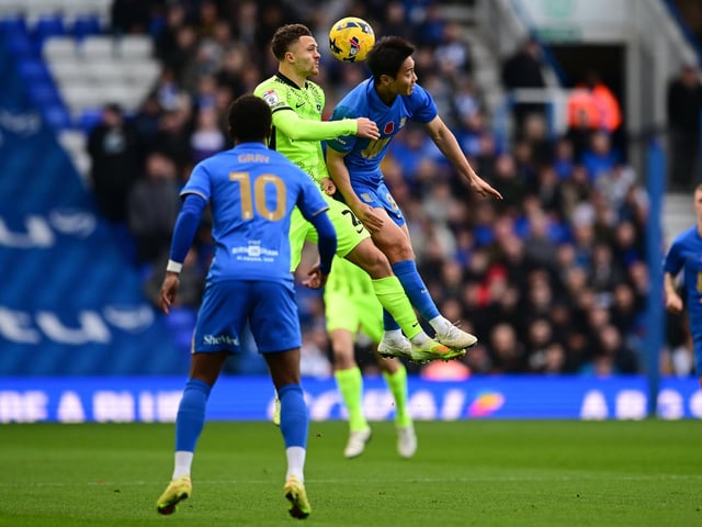 Jordan Williams wins a header in Pompey's trip to St Andrew's. Picture: Dennis Goodwin/ProSportsImages