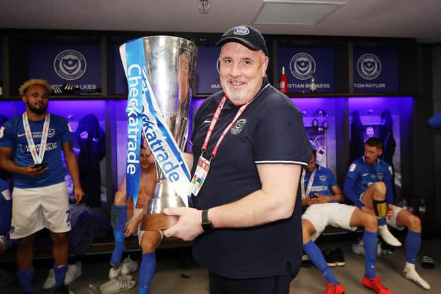 Kev McCormack with the Checkatrade Trophy following Pompey's Wembley win over Sunderland in March 2019. Picture: Joe Pepler