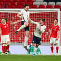Harry Maguire celebrates with Mason Mount after scoring England's winner in their World Cup qualifier against Poland last night. Both are shoo-ins for Gareth Southgate's Euro Championship squad this summer. Photo by Catherine Ivill/Getty Images.