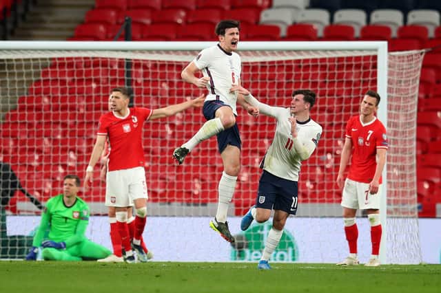 Harry Maguire celebrates with Mason Mount after scoring England's winner in their World Cup qualifier against Poland last night. Both are shoo-ins for Gareth Southgate's Euro Championship squad this summer. Photo by Catherine Ivill/Getty Images.