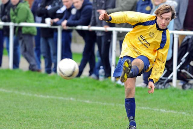 Conor Bailey whips in a cross during a Wessex League game with Horndean in December 2011. Picture: Malcolm Wells