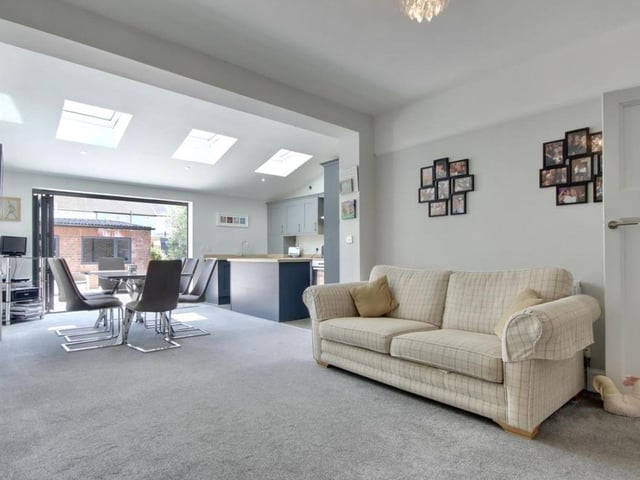 The listing says: "The garden has recently been updated with new patio being laid offering a lovely low maintenance outside space. The garage sits at the rear with electric up and over door. A quite fabulous home that really needs to be seen to be fully appreciated."