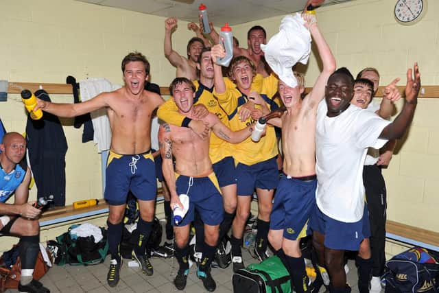 A time-honoured changing room celebratory team picture - Moneyfields have just dumped higher division Gosport out in 2011/12. Picture: Steve Reid