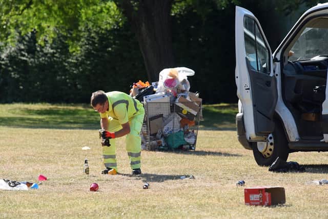 A casual worker who was called in on Sunday, to help the street cleaning team of Portsmouth City Council tidy up Southsea Common. Picture: Simon Czapp/Solent News & Photo Agency