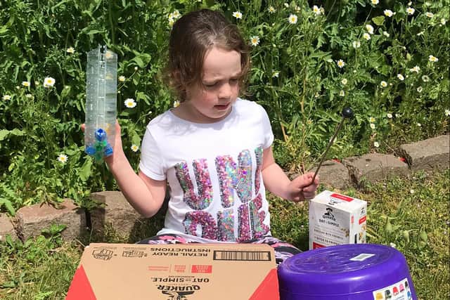 Kalea Green, a pupil at Cottage Grove Primary School, Southsea, making music at home. Picture: Portsmouth Music Hub