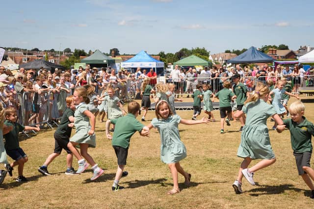 Hook Academy giving a display of folk dancing.