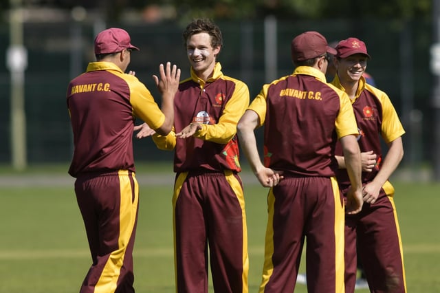 Steve Matthews, second left, took four wickets as Havant 2nds defeated St Cross 3rds in the Hampshire League. Picture: Neil Marshall