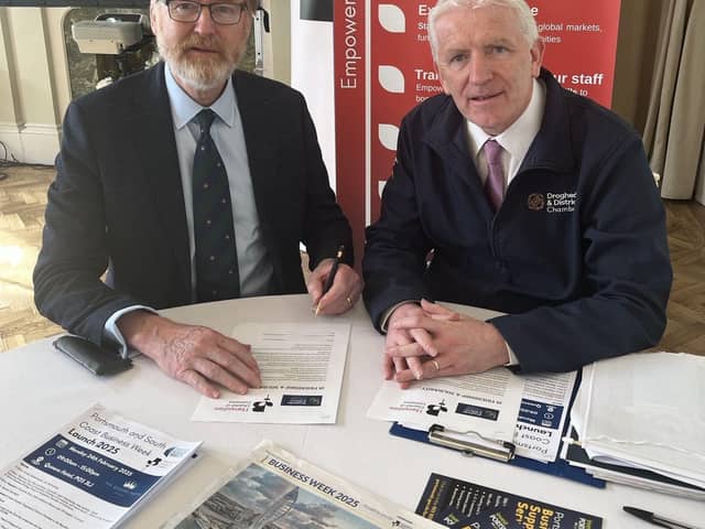 WORKING TOGETHER. Hampshire Chamber Chief Executive and Executive Chairman Ross McNally, left, and Drogheda Chamber Chief Executive Hubert Murphy sign the ‘friendship and solidarity twinning agreement’ in Portsmouth.