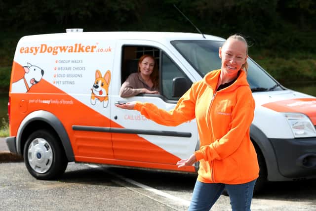 Suzi Neale, right, is the new franchisee for easyDogwalker in the Havant area, pictured here with Lucy Platt, director, at Hilsea LidoPicture: Chris Moorhouse   (jpns 280921-02)
