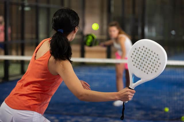 Padel,  a cross between tennis and squash, is rapidly growing in popularity (generic photo: Adobe Stock)