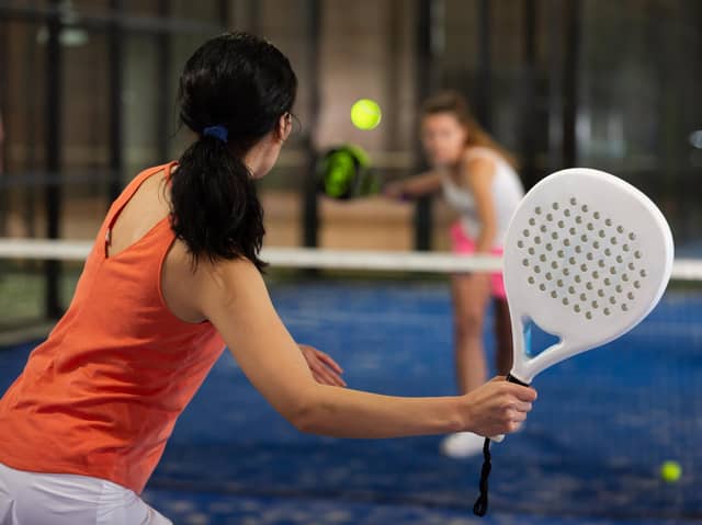 Padel,  a cross between tennis and squash, is rapidly growing in popularity (generic photo: Adobe Stock)