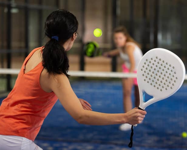 Padel,  a cross between tennis and squash, is rapidly growing in popularity (generic photo: Adobe Stock)