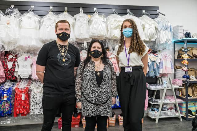Vinnie Gofton (20) with mother Lesley Gofton (62) and Isabelle Ward (26) - Business Support Officer from Autism Hampshire pictured at the Leigh Park shop.
Picture: Mike Cooter