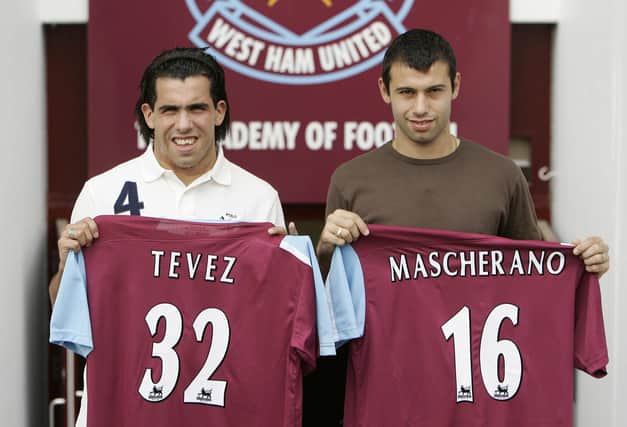 Carlos Tevez, left, and Javier Mascherano signed for West Ham in 2006.Picture: AFP PHOTO/SHAUN CURRY (Getty Images)