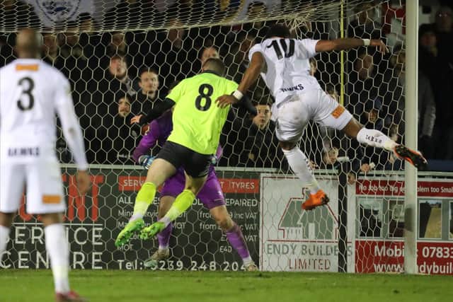 Jonah Ayunga heads Hawks' winner against Weymouth. Photo by Dave Haines