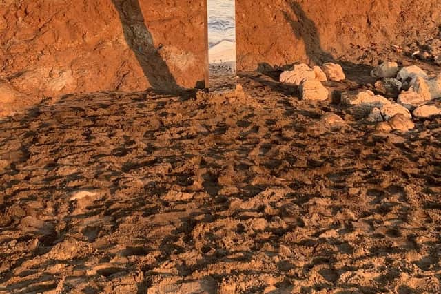 Handout photo issued by Lee Peckham showing a monolith on Compton Beach, on the Isle of Wight. Picture: Lee Peckham/PA Wire