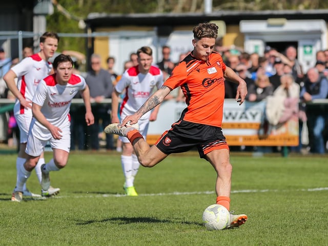 Harrison Brook about to put Portchester ahead from the penalty spot. Picture by Nathan Lipsham
